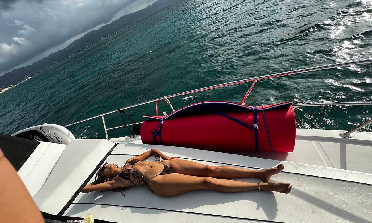 lady lying on deck